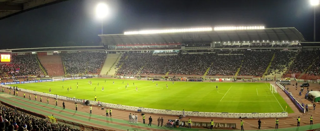 scoreboard at a football stadium at night
