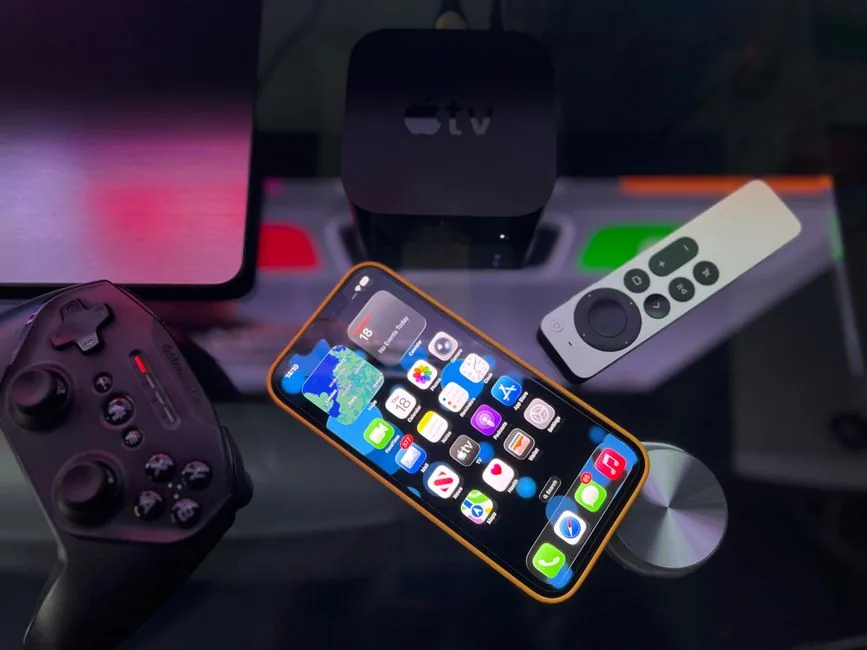 A phone paired with a mobile gaming controller