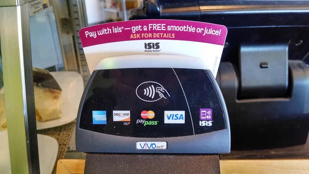 apple pay iphone tap to pay reader closeup