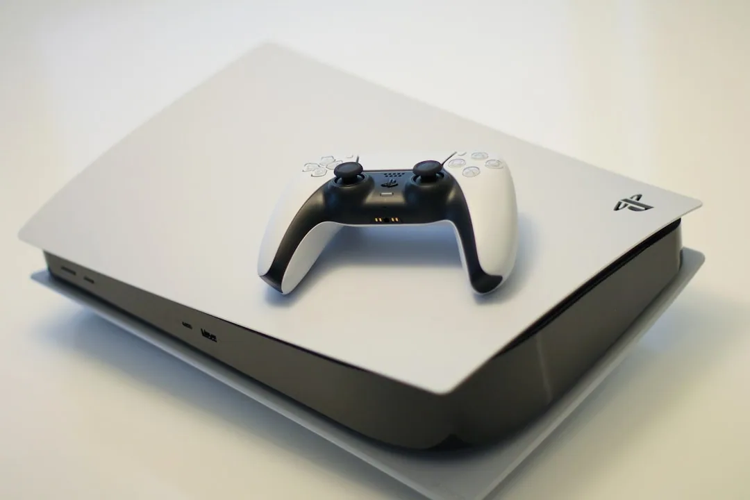 white game console with matching wireless controller
